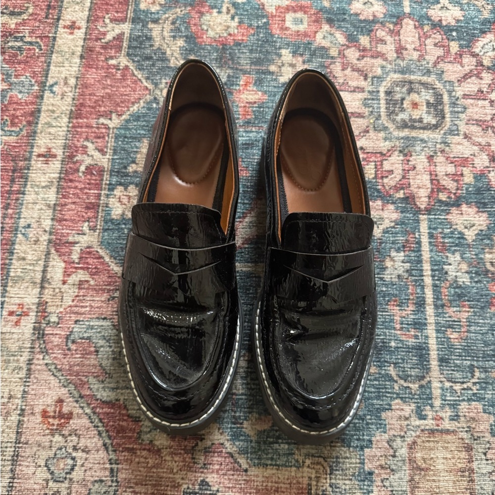 Franco Sarto black leather platform loafers.
